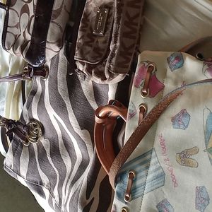 Michael koors. Coach. Dooney and bourke